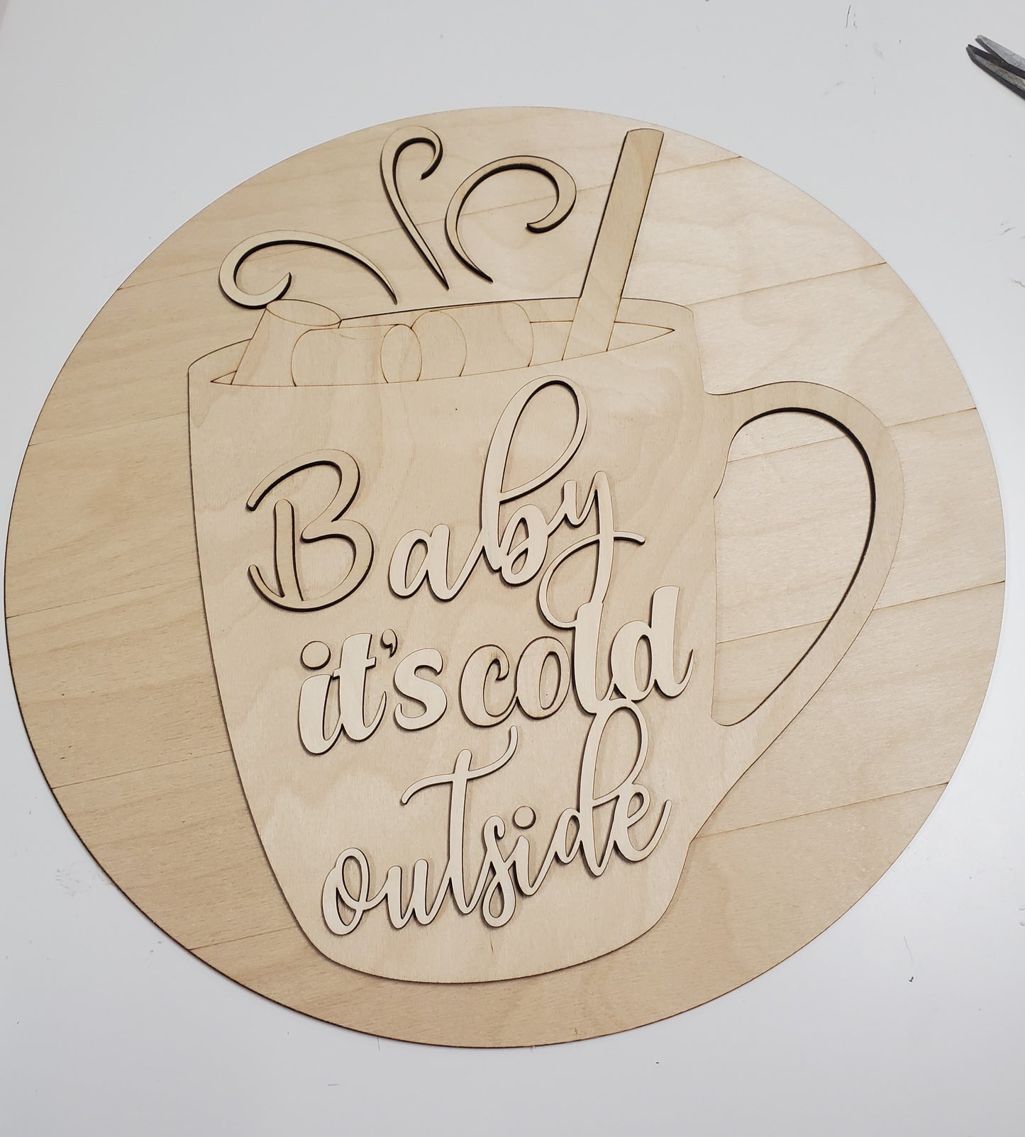 "Baby It's Cold" 16 Inch Round Sign Unpainted